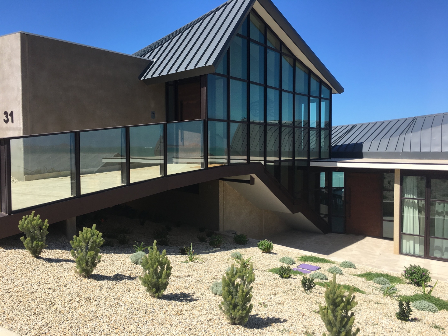 Copper Shack — Port Elliot, pivot door installation in progress