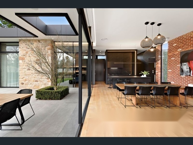 Norwood 18 Project — indoor-outdoor living with sliding glass wall open