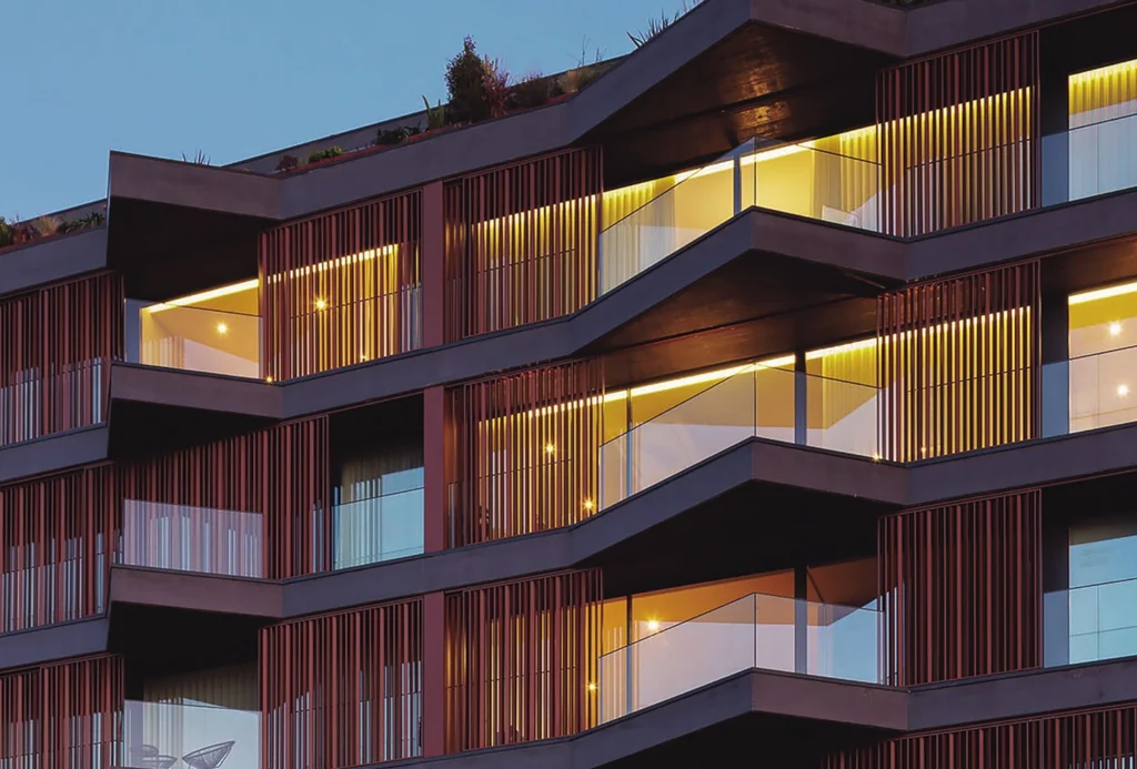 Puro Homes, Aveiro — stacked balconies with Sosoares AV aluminium-and-glass balustrades